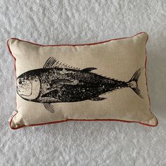 a pillow with a fish on it