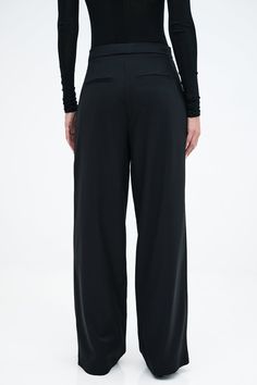 Handcrafted to last, designed for you to love—our Morrison Pants are your next signature cut. She’s fashioned from breathable European polyviscose and tailored to flatter with a wide-leg, high-waist silhouette. Featuring an angled button and hook closure that blends seamlessly into her pleats for unique visual movement, her style is ultra-wearable so you can drift easily from day to night.[SPLIT] Sam, in black, is 5'8" (173 cm) tall, wearing size XS. Astrid, in off white, is 5'9" (175 cm) tall, Modern Wide Leg Pants With Elastic Waistband, Relaxed Fit Full-length Elastane Pants, Formal Elastane Bottoms, Sleek Tailored Wide Leg Pants, Formal Viscose Wide Leg Pants, High-waisted Viscose Wide Leg Pants For Work, Elegant Wide Leg Viscose Bottoms, Elegant Full-length Viscose Bottoms, Elegant High-waisted Viscose Pants