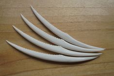 Beautiful Bone Hair Sticks in Snake Tail design is carved in Bali. The carving is very detail in white natural color. ITEM DETAIL : Size approx : 160-170 mm (Long) Hair Sticks Leg : 1 Prong Material : Buffalo Bone Quantity : 1 piece Bone has natural pattern so each piece will be different. PLEASE NOTE : Due to it is a handmade product and using organic materials, it may slightly different from the picture in term of colorization, size and shape. To avoid RETURN AND UNCLAIMED ITEMS, Please email Snake Tail, Natural Twists, Dragon Tail, Tail Hair, Hair Fork, Hair Stick, Organic Materials, Hair Sticks, Hair Pin