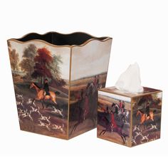 two decorative tissue boxes with horses and riders painted on the sides, one is open