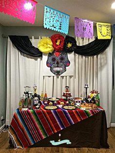 a decorated table with mexican decorations on it