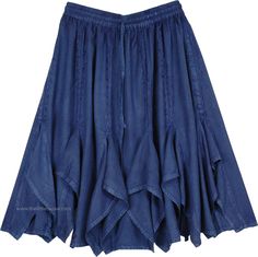 A rodeo-styled gypsy knee-length skirt in beautiful Egyptian Blue color, a deep shade of blue that is cool and perfect for a hot summer season. This is a fun-day skirt with a slight stone wash effect on the fabric. The distinctive element of this skirt is the gore cut and the simple embroidery accent. These gores are attached from the middle of the skirt and they give the skirt its ruffled flare and feminine look. Embroidery in a similar blue hue is done just above the attachment of the gores. T Denim Blue Midi Skirt For Summer, Summer Denim Blue Midi Skirt, Denim Blue Long Skirt For Summer, Long Denim Blue Skirt For Summer, Denim Blue Cotton Ruffled Skirt, Knee-length Blue Denim Skirt For Summer, Blue Knee-length Denim Skirt For Summer, Summer Bohemian Denim Blue Skirt, Summer Denim Blue Flowy Skirt