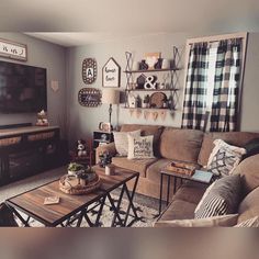 a living room filled with furniture and a flat screen tv