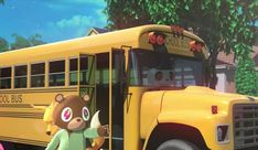 an animated image of a school bus with a bear on the front and side door