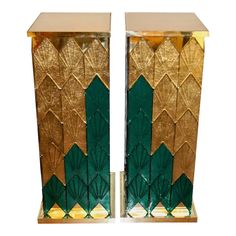 pair of art deco side tables with green and gold leaf design on the sides, circa 1950's