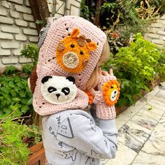 Crochet animals face kids balaclava's are the perfect way to stay warm and stylish during the winter months. These unique, handmade accessories are made from soft yarn and can be worn in a variety of ways, from covering the head and neck to covering the entire face. ❤️❤️ The Crochet animals face Balaclava is a great option for those who want a more traditional, cozy look. The granny square pattern adds a touch of nostalgia while the yarn material keeps you warm and protected from the wind and cold. ❤️❤️ Knitted Balaclava for Women are great for ladies who want a comfortable and fashionable way to stay warm. These balaclava's come in different designs and styles and are perfect for everyday wear. They are also a great option for outdoor activities such as skiing, snowboarding, and hiking. ❤ Balaclava Knitted, Crochet Winter Hat, Crochet Balaclava, Motifs Granny Square, Poncho Crochet, Crochet Winter Hats, Knitted Balaclava, Cozy Accessories, Crochet Winter