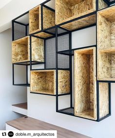 the shelves are made out of plywood and metal mesh, along with wooden flooring