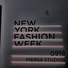 the new york fashion week sign is lit up