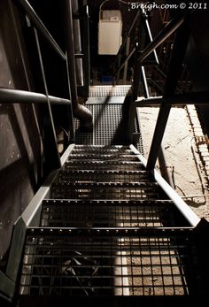 some metal stairs going up to the top