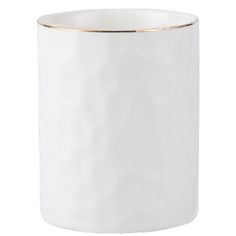 a white vase with gold trim on the rim is shown in front of a white background