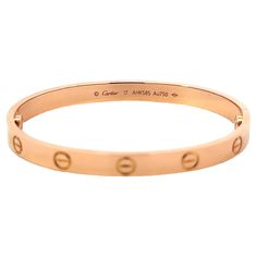 Item Specifications: Brand: Cartier Style: Cartier Love Bracelet Metal: 18K Rose Gold Size: 17 Width: ~6mm Weight: 30.5 grams Luxury Round Bracelets For Valentine's Day, Luxury Engraved Rose Gold Bracelet, Cartier Gold Bracelet For Anniversary, Luxury Wedding Bracelets For Valentine's Day, Classic Cartier Gold Bracelet As A Gift, Classic Cartier Rose Gold Bracelets, Classic Cartier Gold Bracelet Gift, Cartier 14k Gold Bracelet Gift, Classic Cartier Rose Gold Bracelet