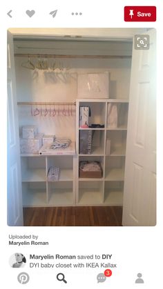 an open closet with clothes hanging on the wall and other items sitting on shelves in front of it