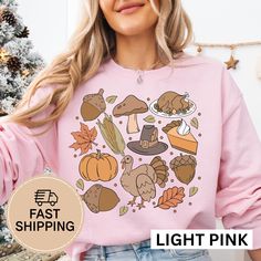 Retro Thanksgiving Shirt | Gildan 18000 Celebrate the season of gratitude in style with our Retro Thanksgiving Shirt! Featuring charming Thanksgiving-themed doodles, this cozy Gildan 18000 sweatshirt is perfect for adding festive flair to your fall wardrobe. 🍂 Design: This unique shirt showcases whimsical Thanksgiving elements like turkeys, pies, and thankful phrases in a retro-inspired design. Whether you're at a family gathering or hosting Friendsgiving, this shirt brings a nostalgic vibe to Thanksgiving Doodles, Whimsical Thanksgiving, Themed Doodles, Hosting Friendsgiving, Season Of Gratitude, Retro Thanksgiving, Turkey Shirts, Thanksgiving Celebration, Fall Tee