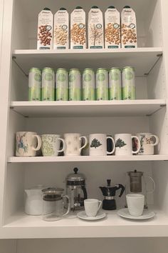 the shelves are filled with coffee and tea