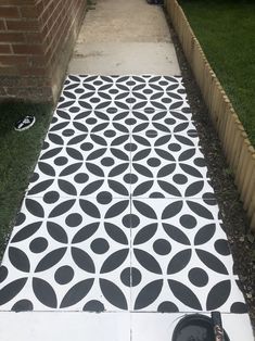 a black and white floor with circles painted on it