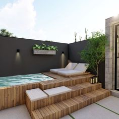 an outdoor pool with steps leading up to it and potted plants on the wall