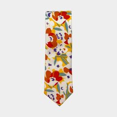 Our Schultz Tie is a bold yellow floral with splashes of blue, red, and green throughout. A tie perfect for both Summer and Spring! Details: ➢ 100% Cotton ➢ 60.25” x 2.25” Yellow Iris, Pocket Square Wedding, Floral Necktie, Mens Holiday, Wedding Pets, Boys Bow Ties, Pets For Sale, Secret Sale, Fabric Sale