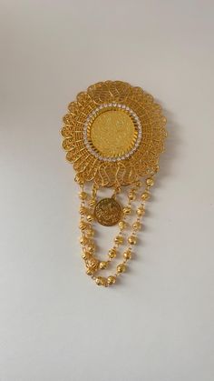 large lira brooch  pendant measures approx 2.5 inches wide and 2.5 inches long with the tassels, the entire brooch is 4.5 inches long  style 1- Halabi/Xordol chain  style 2- ball chain Gold Brooches With Chain For Gifts, Gold Chain Brooch For Gifts, Gold Brooch With Large Pendant As Gift, Oct 31, Long Style, Ball Chain, Chain Styles, Brooch Pin, Brooches