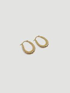 DESCRIPTIONImmediately yes. Your classic gold hoops but with a little extra flair. Their "beaded" details, tapered to perfection, instantly adds texture to your look. Compliments are to be expected. DETAILS- always made in 14k gold- hoop measurement: 18mm x 15mm- model wears in first hole Beaded Hoops, Classic Gold, Gold Hoops, Gold Hoop, Stud Earrings, Texture, Gold