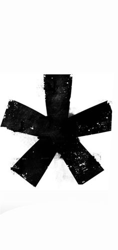 an artistic black and white photo of a cross