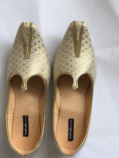 The white and gold Men's slip on Shoes, white Mens Flats,Mens Slippers,Flats,Handmade Slippers,Men's Shoes,Mens Casual Shoes, Indian shoes, Rajasthani shoes, wedding juttis, shoes for groom SIZING INSTRUCTIONS- Need assistance, please convo me 1. These shoes run true to the standard US size and are available in medium width only. 2. I suggest that you select the shoe size based on the length closest to your feet measurement. 3. The Length of Foot is not equivalent to the length of the shoes. Not Traditional Round Toe Slip-ons For Formal Occasions, Traditional Formal Slip-ons With Round Toe, Gold Slip-on Wedding Shoes, Traditional Closed Toe Formal Loafers, Traditional Formal Closed Toe Loafers, Gold Slip-on Shoes For Formal Wedding, Gold Slip-on Wedding Shoes For Formal Wear, Traditional Gold Slip-on Wedding Shoes, Traditional Pointed Toe Wedding Shoes For Formal Occasions