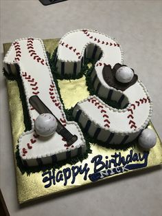 a baseball themed birthday cake with the number twenty five