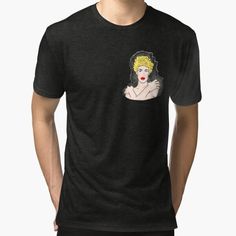 a man wearing a black t - shirt with a drawing of a woman's face