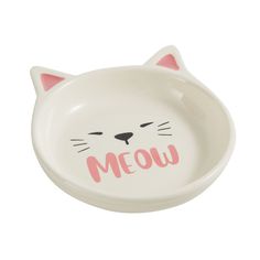 a white cat dish with the word meow painted on it's front and side