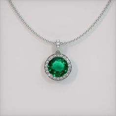 The pendant features a beautiful, transparent 3.10 carat round shape green emerald with the dimensions of 9.74 x 9.65 x 5.49 mm and a mixed brilliant cut. It has a clarity grade of very slightly included (evaluated at eye level), vivid color saturation, and an excellent polish. #littlenecklaces #girlsnecklaces #gorgeousnecklaces #customjewelrynecklaces #heartnecklaces Luxury Green Round Pendant Jewelry, Emerald Pendant Set, Custom Jewelry Necklaces, Emerald Necklace Pendant, Emerald Pendant, Emerald Necklace, Girls Necklaces, Cut It, Emerald Jewelry