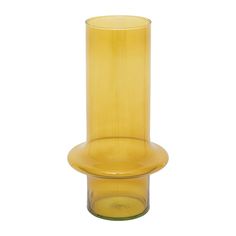 a yellow glass vase sitting on top of a white table next to a cup holder