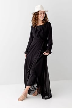 The Esperanza maxi dress offers an all-in-one look that is effortlessly elegant! Gorgeous ruffle detailing and faux wrap construction give this long-sleeve dress feminine flair that is flattering on all body types. Style with nude heels and a statement bag for a look that is sure to make you feel confident and beautiful! Self & Lining 100% Polyester Wash Inside Out Cold Gentle Cycle No Chlorine Hang to Dry Low Iron if Needed Do Not Dry Clean Fully Lined NON-RETURNABLE FINAL SALE Model Height 5'7 Dress Feminine, Wrap Maxi Dress, Statement Bag, Wrap Midi Dress, Feminine Dress, Nude Heels, Maxi Wrap Dress