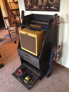 an old amp stands in the middle of a living room