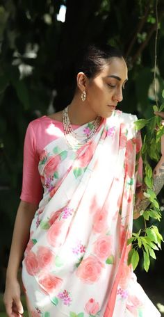 A made-to-order Crepe handpainted saree with beautiful Mukaish work. Pack contains: Saree + Blouse fabric Delivery : 3-4 Weeks White Digital Print Saree For Wedding, Traditional White Pre-draped Saree With Floral Print, Traditional Georgette Pre-draped Saree With Digital Print, Traditional Pre-draped Saree In Georgette With Digital Print, Traditional Pink Saree With Digital Print, Pink Digital Print Saree For Festivals, Festive White Saree With Digital Print, Traditional White Floral Digital Prints, Traditional White Saree With Floral Print