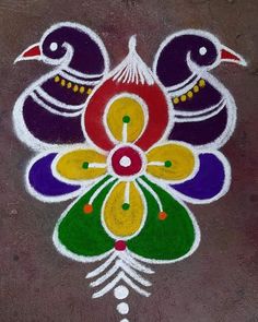 an artistic design painted on the ground with white and purple colors, birds are sitting in the center