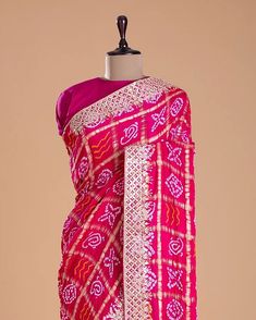 Magenta Pink Bandhani Printed Gajji Silk Saree Presenting our stunning Magenta Pink Bandhani Printed Gajji Silk Saree, where tradition meets contemporary elegance. Crafted from luxurious Gajji silk, this saree boasts vibrant magenta pink hues adorned with intricate Bandhani prints. Elevate your ethnic ensemble with this exquisite piece, perfect for adding a pop of color to any occasion. Worldwide free shipping Contact us: +91-7976261840 Email: Epicsaree@gmail.com Website: www.epicsaree.com ... Bandhani Saree, Pink Color