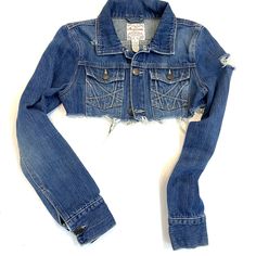 This, weathered vintage  denim jacket has been intentionally cropped and distressed.  Frayed hem.  Fits approx. a size XS/S.  Aeropostale  brand.  When buttoned up, the bust line measures 32 inches around.  It is 11 inches long from the top of the shoulder to the hemline.  The sleeves are 25 1inches long.   Find  handmade clothing & accessories at:  dinwiddies.etsy.com Find unique items for the home at:  dinwiddieshome.etsy.com www.dinwiddies.blogspot.com Cropped Denim Jacket With Frayed Hem, Fitted Medium Wash Cropped Denim Jacket, Cropped Ripped Medium Wash Outerwear, Medium Wash Cropped Ripped Outerwear, Cropped Washed Denim Jacket, Distressed Cropped Denim Outerwear, Fitted Cropped Denim Jacket With Frayed Hem, Cropped Fitted Denim Jacket With Frayed Hem, Cropped Distressed Denim Outerwear