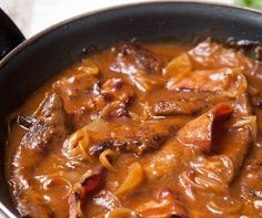 there is a stew in a pan on the table