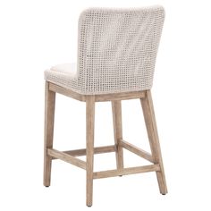 a white wicker bar stool with a cushion on the seat and backrests