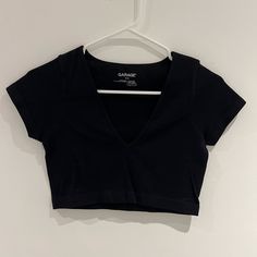 Garage Black Seamless Top! Nwot, In Perfect Condition And Never Worn Before! Crop Top And Stretchy Seamless Black Seamless V-neck Top, V-neck Seamless Crop Top For Workout, Seamless V-neck Crop Top For Workout, Casual Black Seamless Tops, Casual V-neck Top With Seamless Design, Casual V-neck Tops With Seamless Design, Casual V-neck Seamless Tops, Summer V-neck Top With Seamless Design, Seamless V-neck Workout Top