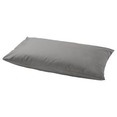 a gray pillow on a white background