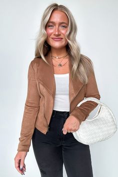 Details: Zip up and hit the road with our Brynlee Faux Suede Moto Jacket. This stylish and durable jacket features a soft faux suede material and a convenient zip up design for easy wear. Perfect for adding a touch of edge to any outfit. Rev up your wardrobe with this must-have jacket! - Faux suede - Moto style Content: 95%POLYESTER 5%SPANDEX Size + Fit: Model is 5'8" and wearing a Small - Measurements from a size Small are approx - Full length: 21.5" - Chest: 38" - Waist: 34" - Sleeves: 23" Bra Casual Suede Biker Jacket, Casual Suede Biker Jacket For Fall, Casual Suede Biker Jacket For Work, Casual Suede Outerwear With Zipper Closure, Suede Outerwear With Zipper Closure, Suede Outerwear With Zipper And Long Sleeves, Suede Outerwear With Zipper Closure And Long Sleeves, Casual Suede Fitted Biker Jacket, Casual Fitted Suede Biker Jacket