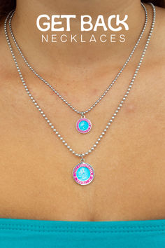 Check out our new Aqua Fuchsia St. Christopher Necklace! Featuring a cool aqua center surrounded by a bold fuchsia pink outer rim, this eye-catching design is perfect for those who love to stand out. Bursting with vibrant energy and playful charm, this piece is sure to add a pop of color to any outfit. 

- 3/4” Silver Plated St. Christopher Medal

- 24” Ball Chain Necklace (cut ball chain to fit your style)

- Get Back stamp Ensures Authenticity Vibrant Energy