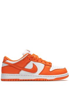 Supplied by a premier sneaker marketplace dealing with unworn, already sold out, in demand rarities. Each product is rigorously inspected by experienced experts guaranteeing authenticity. The Nike Dunk Low “Syracuse” is a special March 2020 release that draws inspiration from the beloved “Be True to Your School Pack” from 1985. The bold colorway mirrors the team uniform colors of the Syracuse Orange Men’s and Women’s basketball squads, and was worn on court by the teams in the mid-80s. The “Syracuse” Dunk released alongside a range of makeups for some of the top collegiate teams in the nation at the time. The modern version features buttery orange leather overlays that are contrasted by a white leather base that is visible on the mid-panel, toe, and heel. Orange Swooshes cover the mid-pane Nike Dunk Low Syracuse, 2022 Sneakers, Nike Dunk Low Sp, Dr Shoes, Orange Shoes, Cute Nike Shoes, Nike Brand, Cute Nikes, Swag Shoes