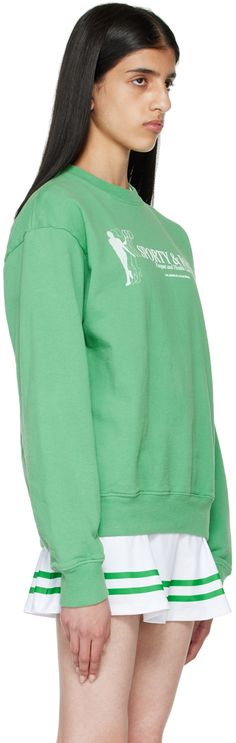 Cotton fleece sweatshirt. · Rib knit crewneck, cuffs, and hem · Logo and text printed at chest Supplier color: Kelly green/White Rich Clothing, Paris Country, Rich Clothes, Club Sweatshirts, Rich Green, Sporty And Rich, Knit Crewneck, Fleece Sweatshirt, Cotton Fleece