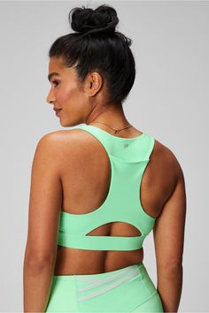 On-The-Go Midi Medium Impact Sports Bra Fabletics green female Activewear >> Womens >> Sports Bras >> Sports Bra >> Medium Impact regular Medium-impact style with cut-out detail Green High Stretch Go-dry Activewear, Green Go-dry High Stretch Activewear, High Stretch Green Activewear For Sports, Green Stretch Activewear For Light Sports, Green Breathable Functional Activewear, Green Compression Activewear For Light Sports, Green Breathable Gym Activewear, Green High Stretch Sweat Resistant Activewear, Breathable Green Activewear For Gym