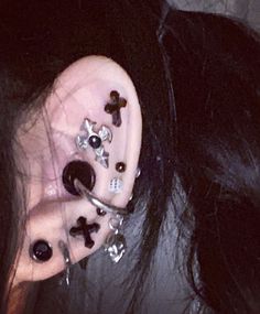 a woman with ear piercings on her ears