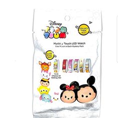 mickey and minnie mouse wrist watches in plastic bag