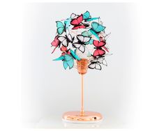 This Beautiful Butterfly Bedside Lamp is great as a Kids Room Nightlight and the ideal gift for those who love whimsical, magical, or dreamy decor. Properties:  This table lamp made of iron base with clear copper finish, copper wire, and teal, rose and white, or plain white butterflies made of French Vellum. You can also combine this lamp with its chandelier lighting version:  https://www.etsy.com/listing/1096904645/ or get the set of ceiling and table lamp here with discount! https://www.etsy.c Dreamy Butterfly, Copper Desk, Butterfly Light, Dreamy Decor, White Butterflies, Butterfly Lighting, Delicate Butterfly, Copper Accents, Wooden Pegs