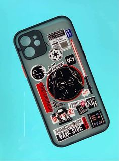 a cell phone case with stickers on it and a darth vader helmet