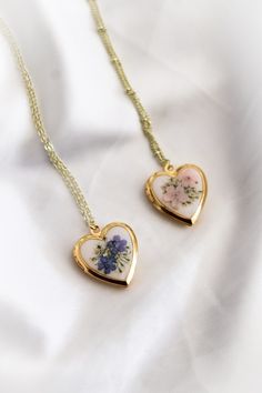 This Pendant Necklaces item by EmandLilyCo has 1493 favorites from Etsy shoppers. Ships from Staunton, VA. Listed on May 21, 2024 Wildflower Photo, Necklace Resin, Photo Locket Necklace, Floral Jewelry, Dope Jewelry, Dried Floral, Photo Locket, Funky Jewelry, Jewelry Lookbook